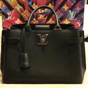 Louis Vuitton Lock-me day handbag